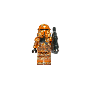 Minifigura de colección de un Clone Airborne Trooper de Star Wars con armadura completa de camuflaje de Geonosis en tonos naranja, arena y marrón. Está de pie sobre una base negra sosteniendo un bláster pesado negro, y a su lado izquierdo se exhibe una pieza de torso extra con el mismo patrón de camuflaje, todo sobre un fondo blanco.